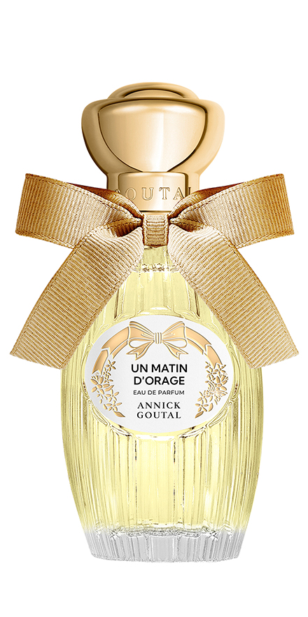 Perfume bottle with a gold cap and beige ribbon, labeled 'Un Matin d'Orage' by Annick Goutal.